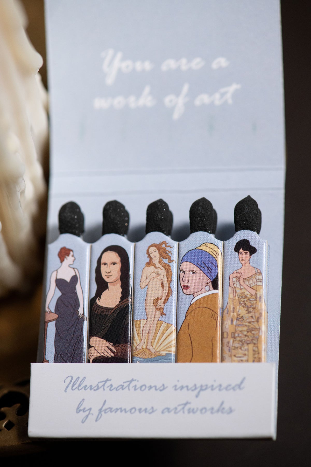 A close up of the stems of the You are a work of art matches featuring Madame X, Mona Lisa, Birth of Venus, Girl with a Pearl Earring, and Adele Bloch-Bauer.