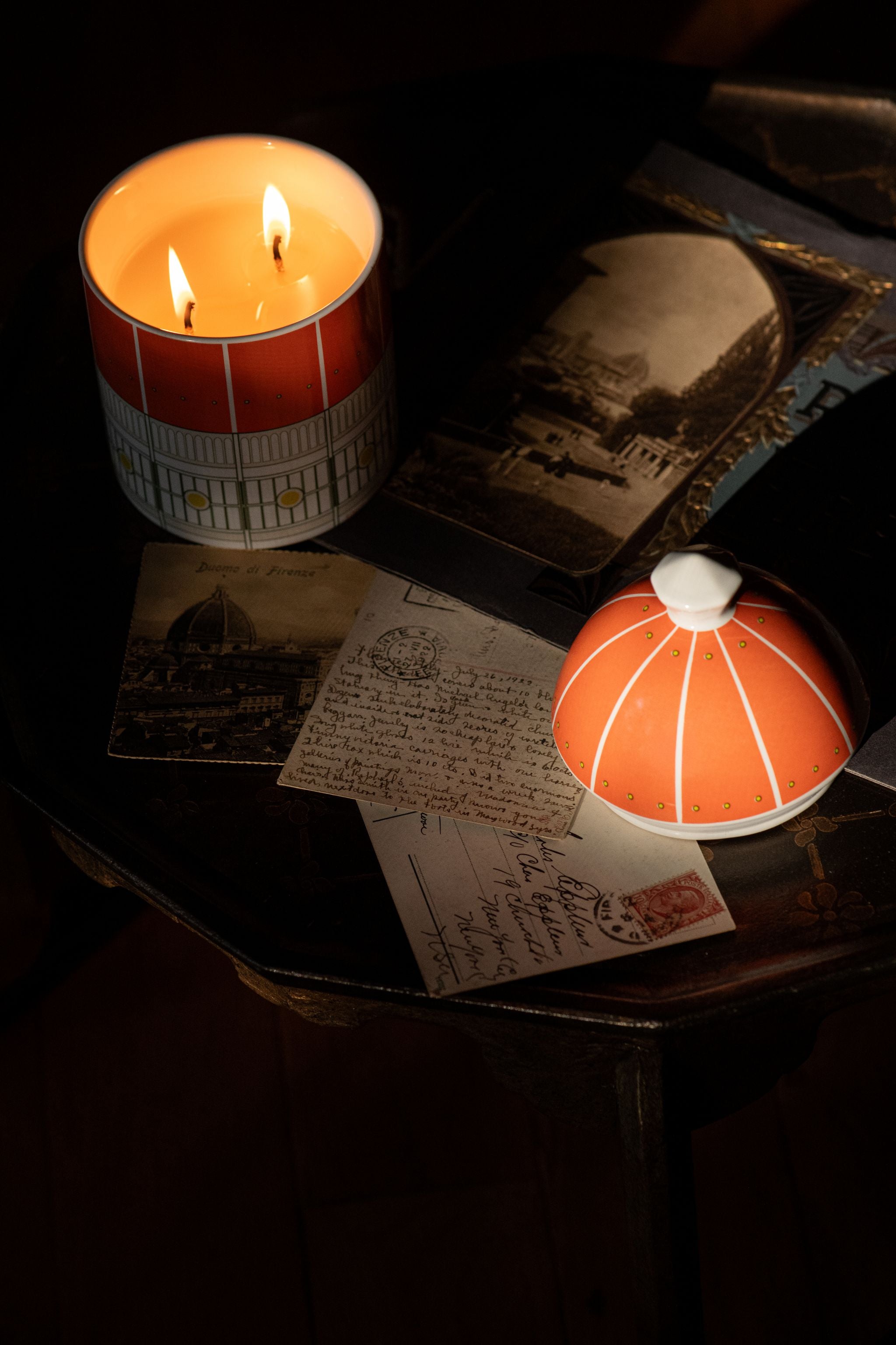 Our Duomo Heaven Scent candle with vintage relics from Florence. The candle is soy and double wicked and evokes citrus groves.
