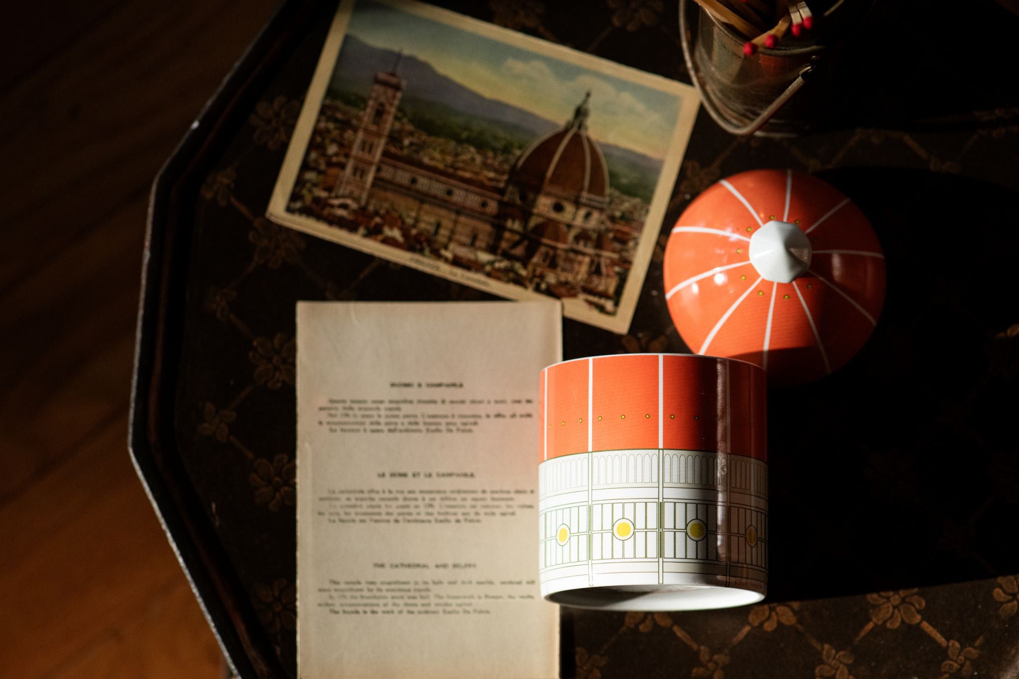 Our Duomo Heaven Scent candle with a postcard of the actual Duomo in Florence Italy which highlights the architectural nature of the piece.