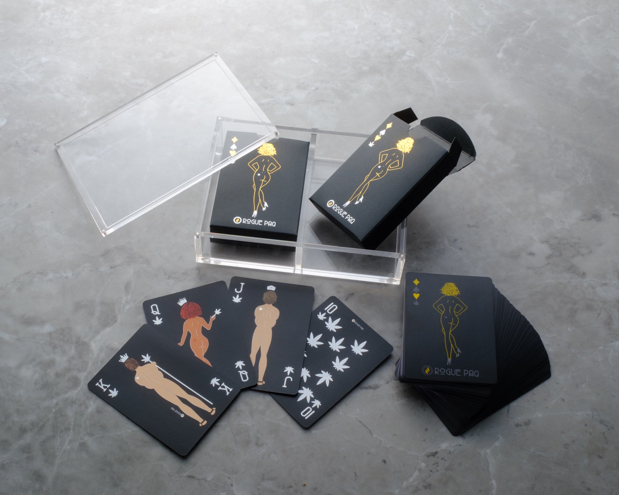 SendNudes playing cards spread to show custom nude Royal figures and vintage-style artwork; printed on premium 300gsm blue core paper with a linen finish for smooth shuffling