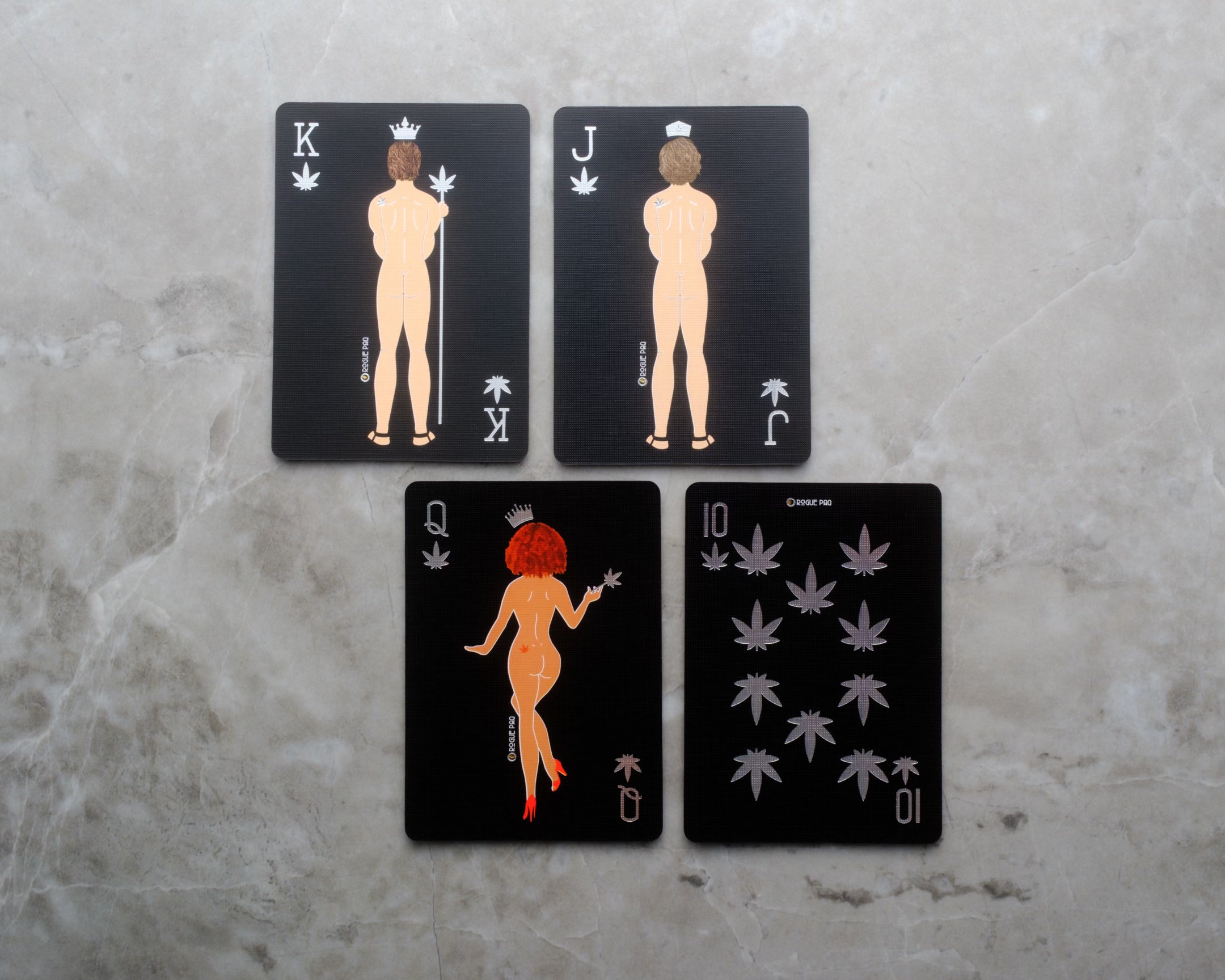 SendNudes playing cards spread to show custom nude Royal figures and vintage-style artwork; printed on premium 300gsm blue core paper with a linen finish for smooth shuffling