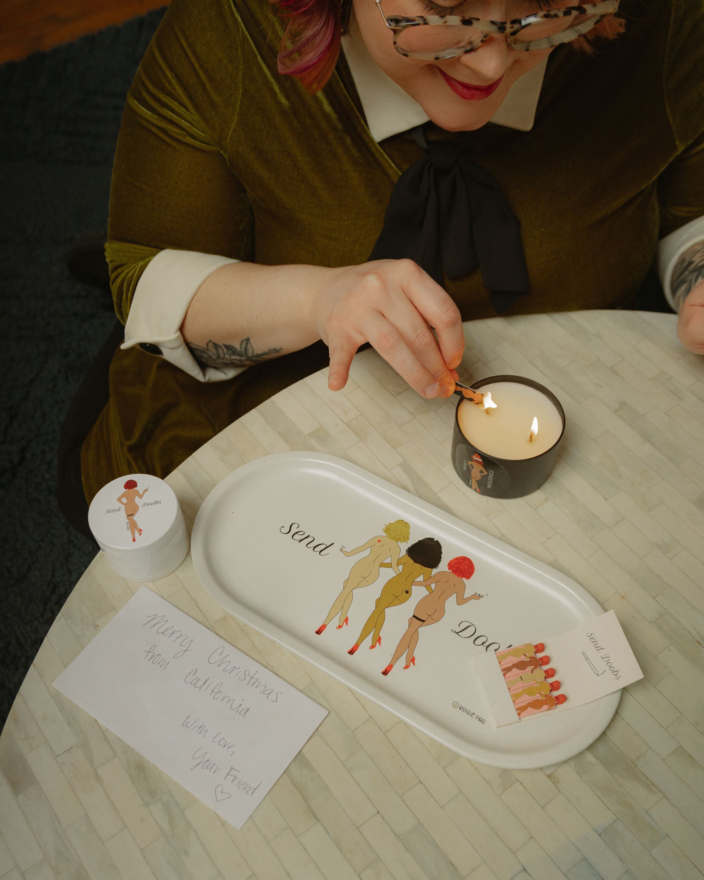 All-natural 8oz soy wax candle with essential oil mint and citrus. Styled with the Send Doobs valet tray, grinder and matches.