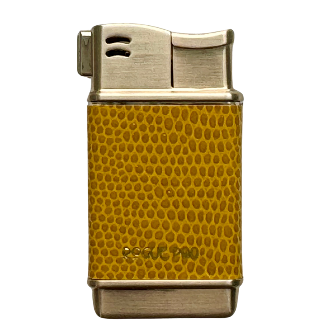 Rogue Paq refillable butane lighter in bright Marigold yellow. This forever luxury lighter features a gold-tone finish and high-quality vegan skin, bringing a bold pop of color to the cannabis ritual.