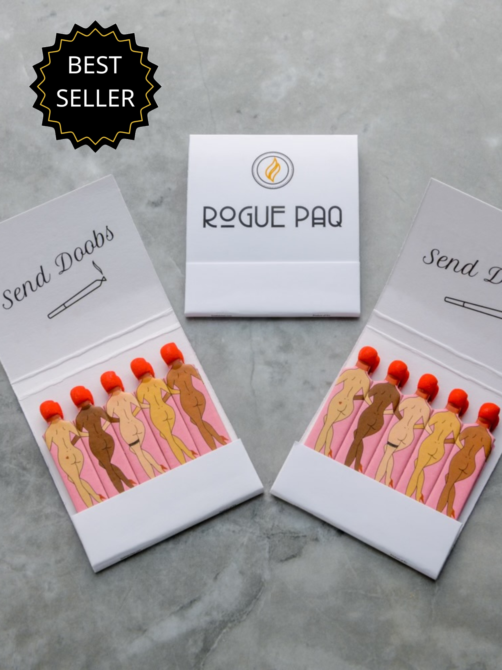 Rogue Paq SendNudes Matches: Send Doobs set of 3 premium matchbooks featuring vintage-style figures with distinctive red hair for a whimsical cannabis ritual.