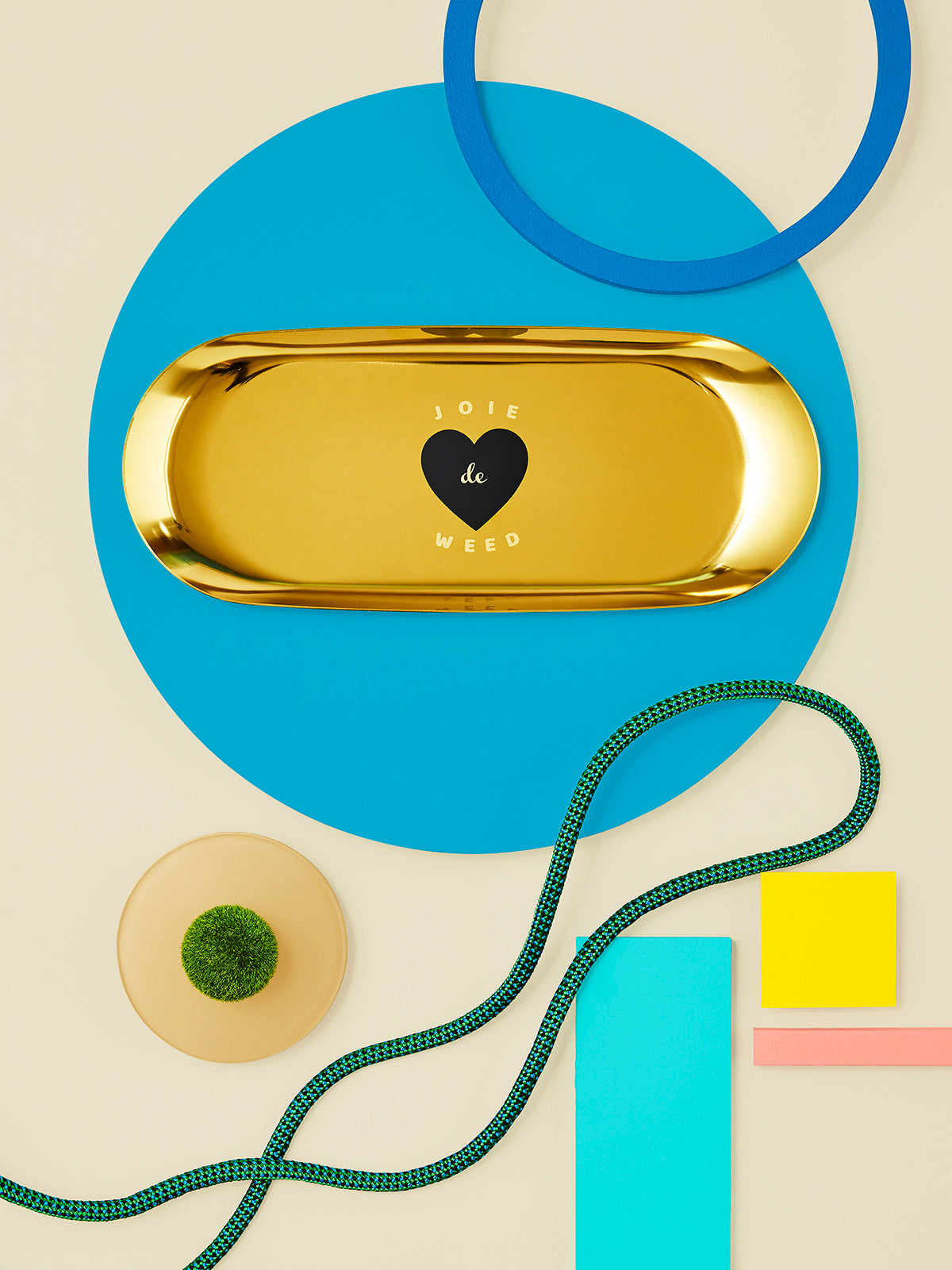 Joie de Weed luxury joint rolling tray flatlay, beige background