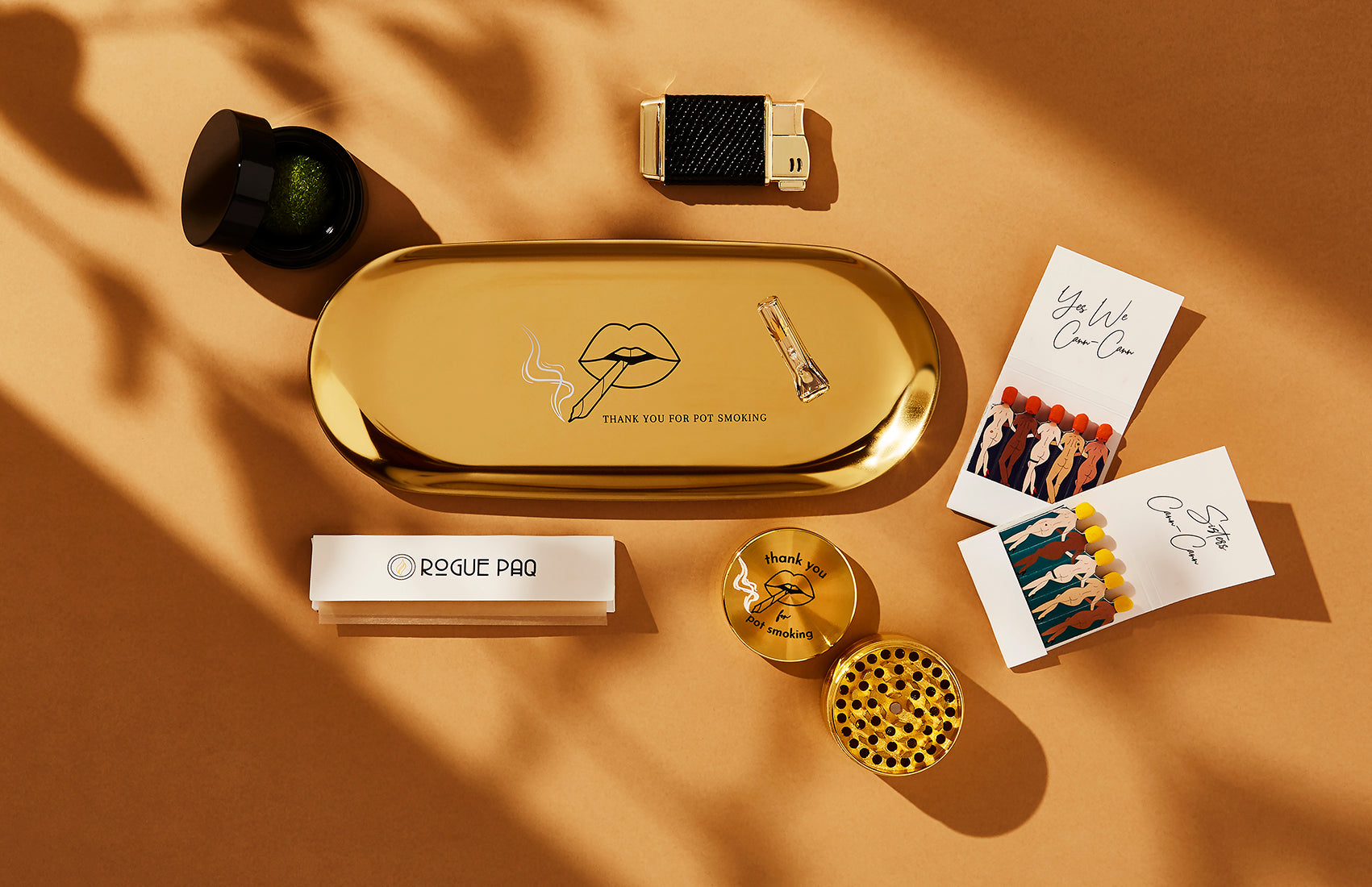 The Thank You for Pot Smoking ritual gift set is a perfect gift for anyone who loves cute smling accessories. It comes with a 4 piece 50mm Thank You grinder, a thank you rolling tray, two books of SendNudes matches, a glass tip, and a refillable lighter.