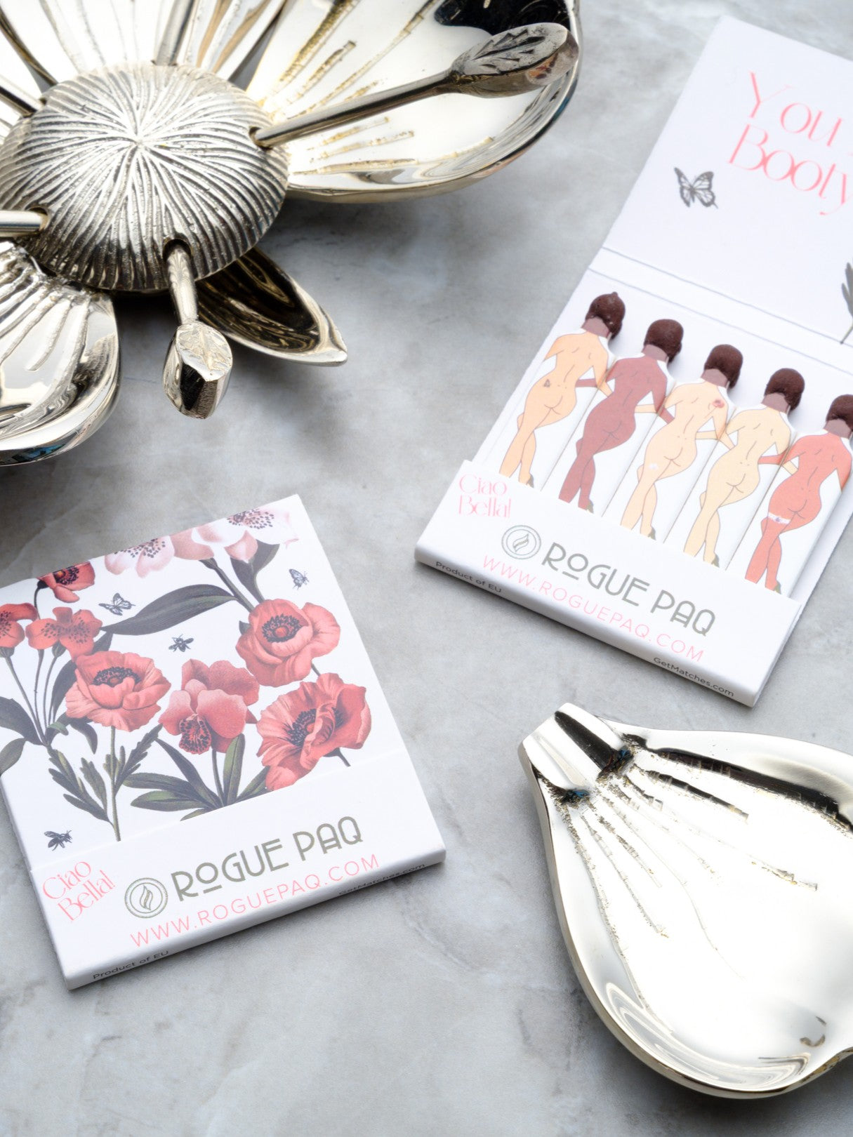 nickel plated brass poppy ashtray shown with novelty safety matches in the You are Bootyful design. These items are being sold as a bundle. 