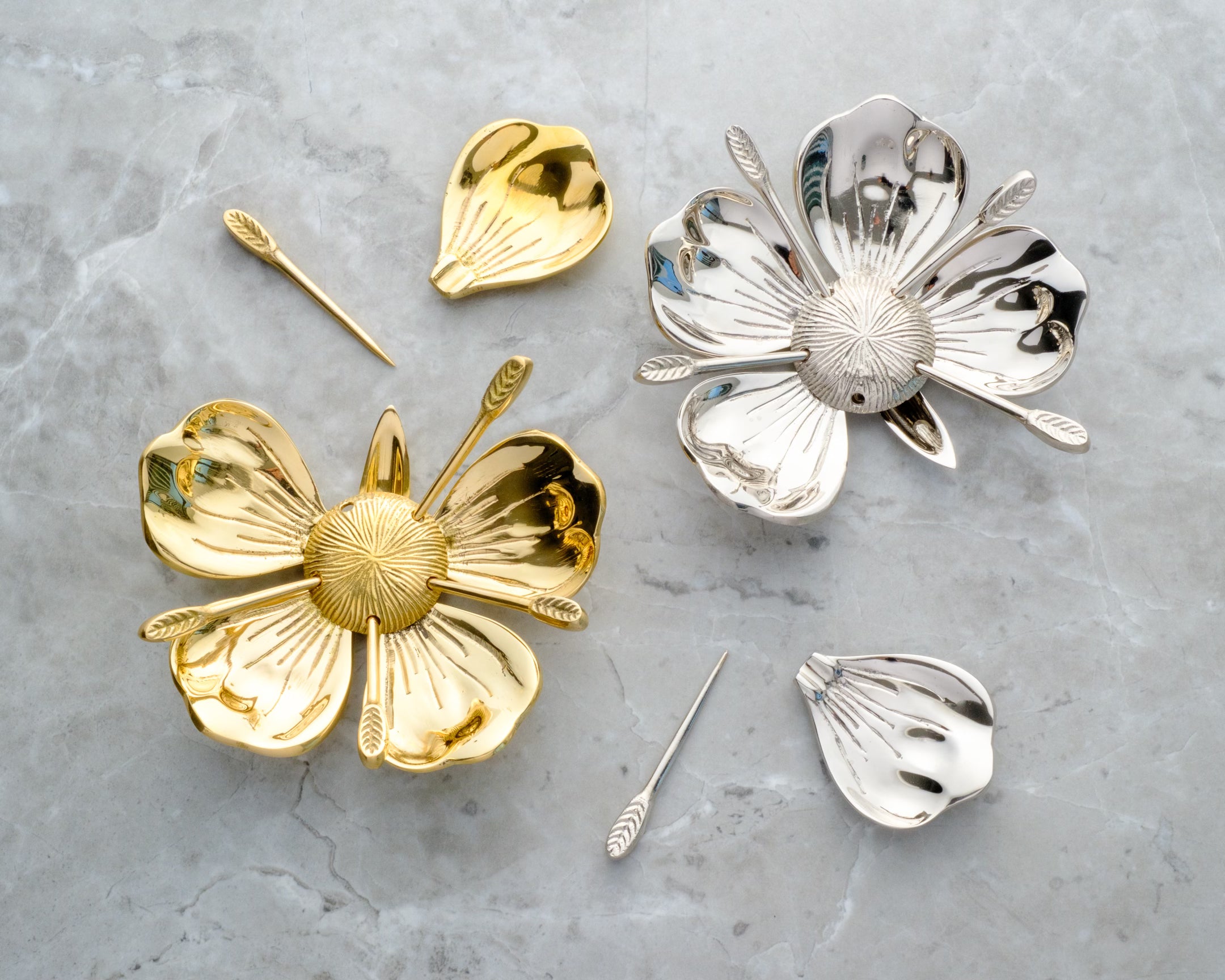 Poppy Party Ashtray in polished brass and nickel finishes; featuring five removable flower petals that serve as individual guest ashtrays for a social smoking ritual.