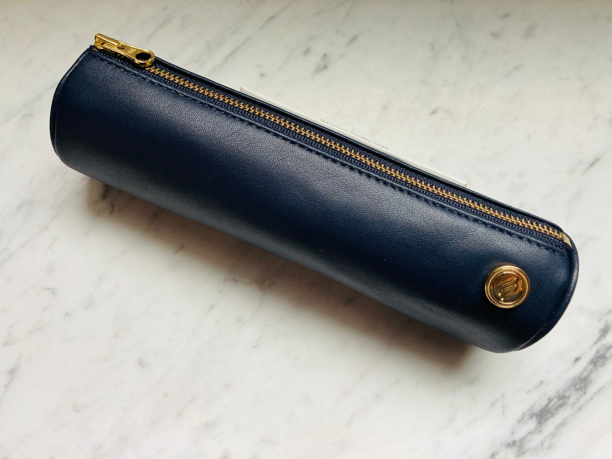 This travel case is perfect for those in need of a scent proof leather stash bag. This luxury cannabis travel case acts as a discreet weed pouch and features buttery lambskin leather and gold-toned hardware for the ritualist looking for high-end fashion quality in their smoking accessories.