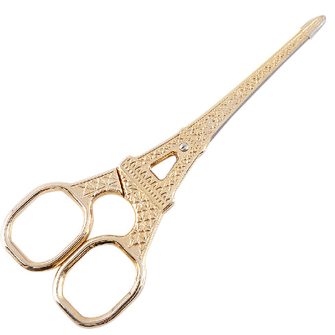 A pair of gold-toned precision trim scissors featuring a highly detailed handle shaped like the Eiffel Tower. The metallic gold finish gives the surgical-grade stainless steel a luxury look, perfect for fine-tuning joints and trimming flower.